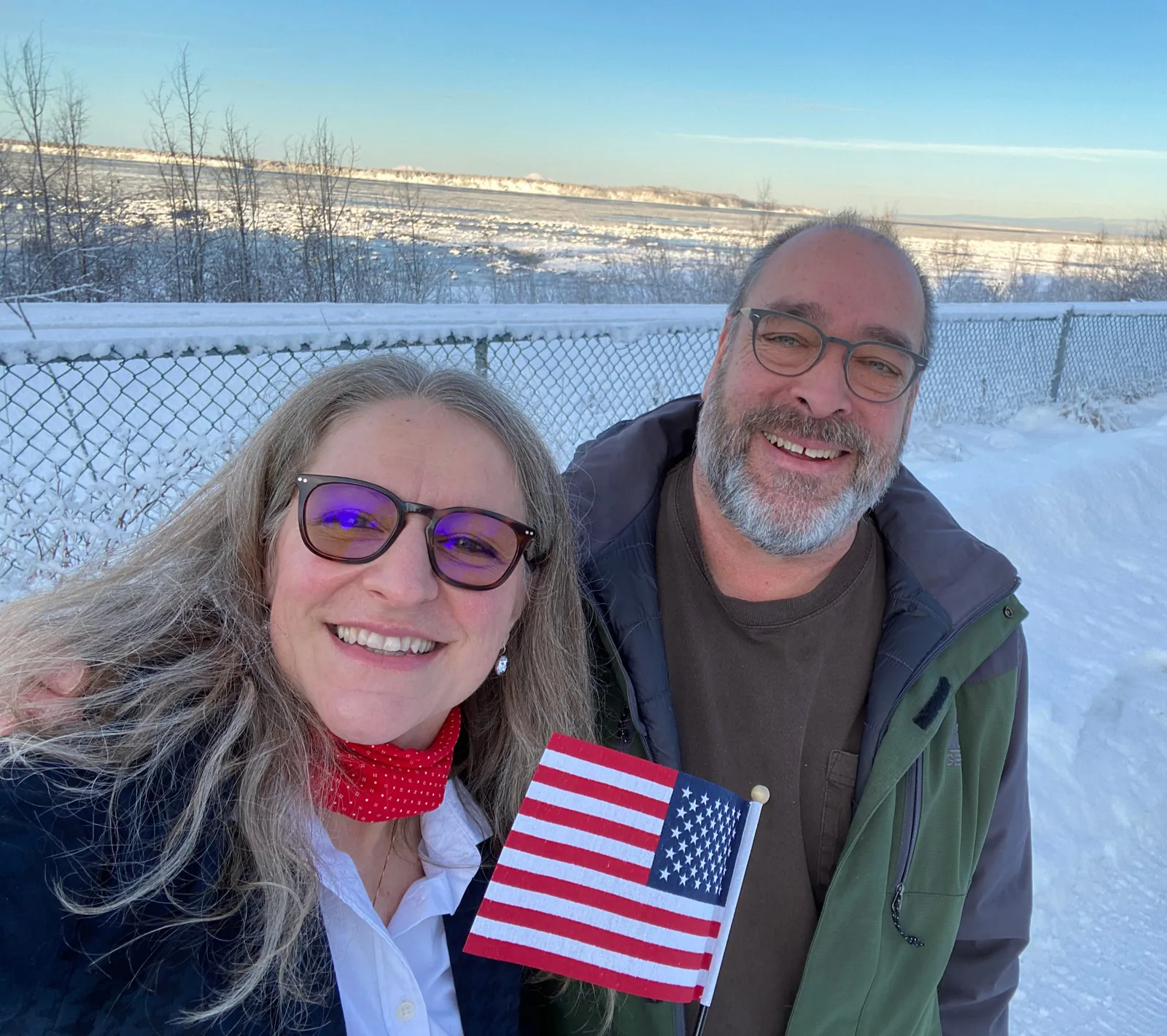 Ellie Brollo and Dave Singyke, owners of Forget-Me-Not Media, on the Anchorage coastal trail in winter